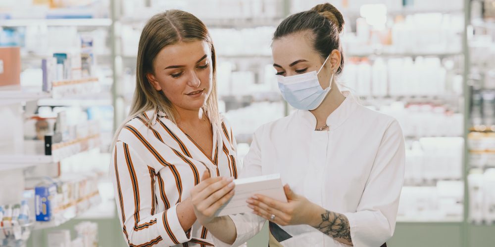 woman-pharmacist-checking-medicine-in-pharmacy.jpg